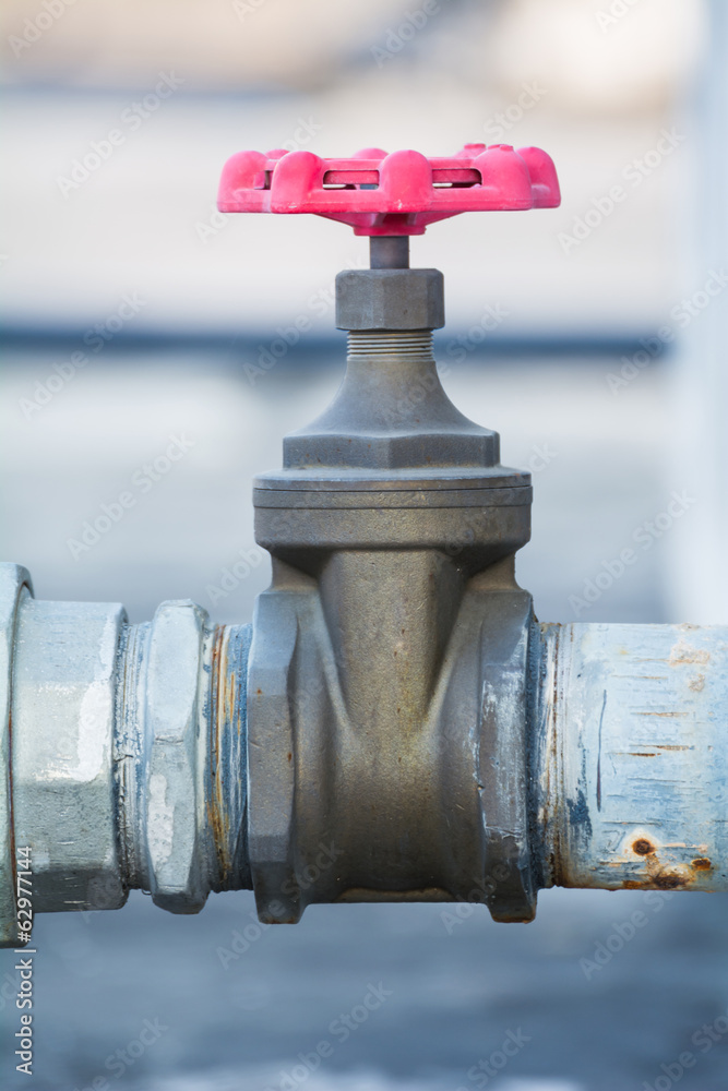 Old gate valve with copper-brass material in factory plant