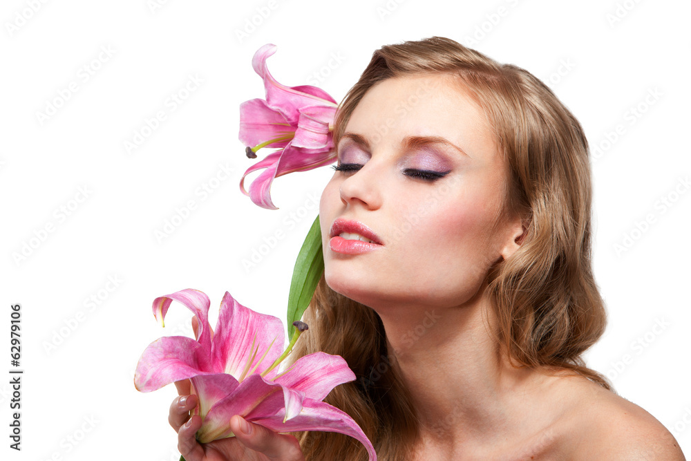 Young woman with pink lily