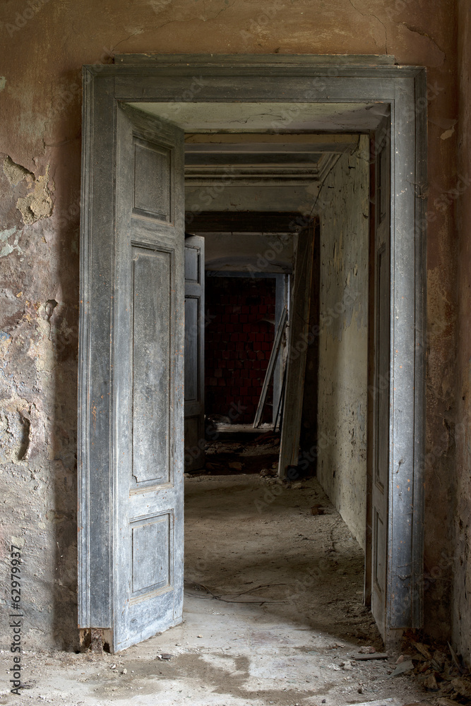 Doors against the wall in abandoned house