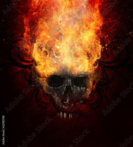 Burning skull. Sketch of tattoo art  fire with tribal flourishes
