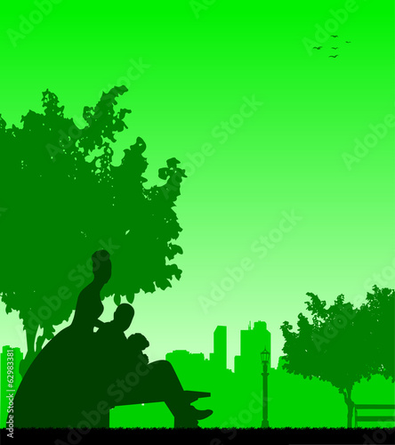 Wedding couple posturing in park silhouette