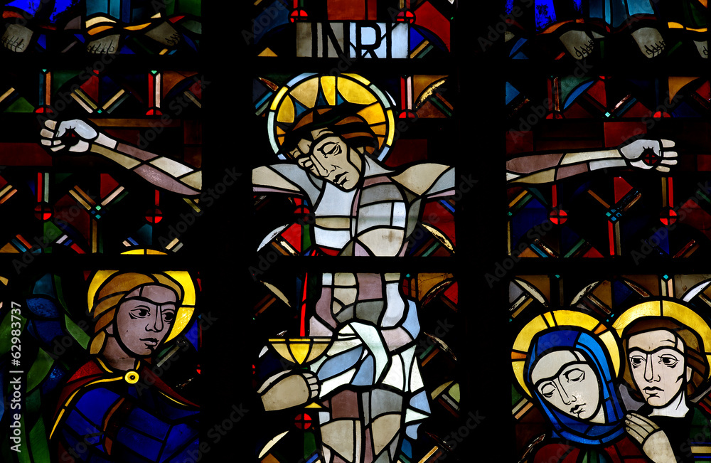 Crucified Christ and the Holy Chalice, in stained glass