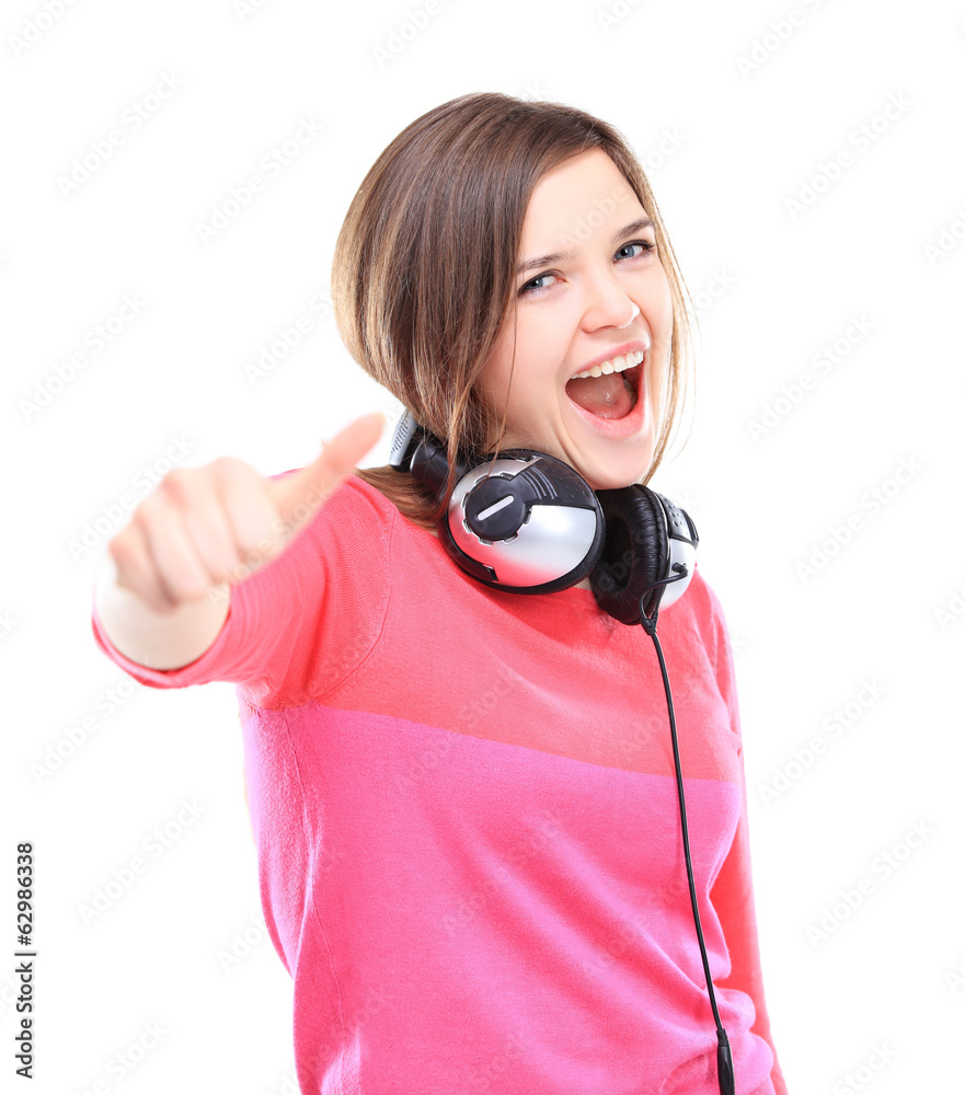 Portrait of attractive young woman showing a thumbs up Portrait of attractive young woman showing a thumbs up