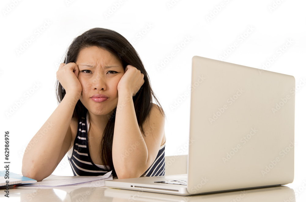 pretty asian woman student overworked on computer pretty asian woman student overworked on computer