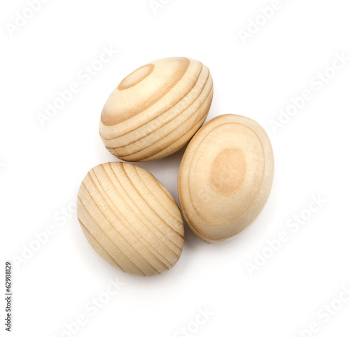 Wooden easter eggs isolated on white background