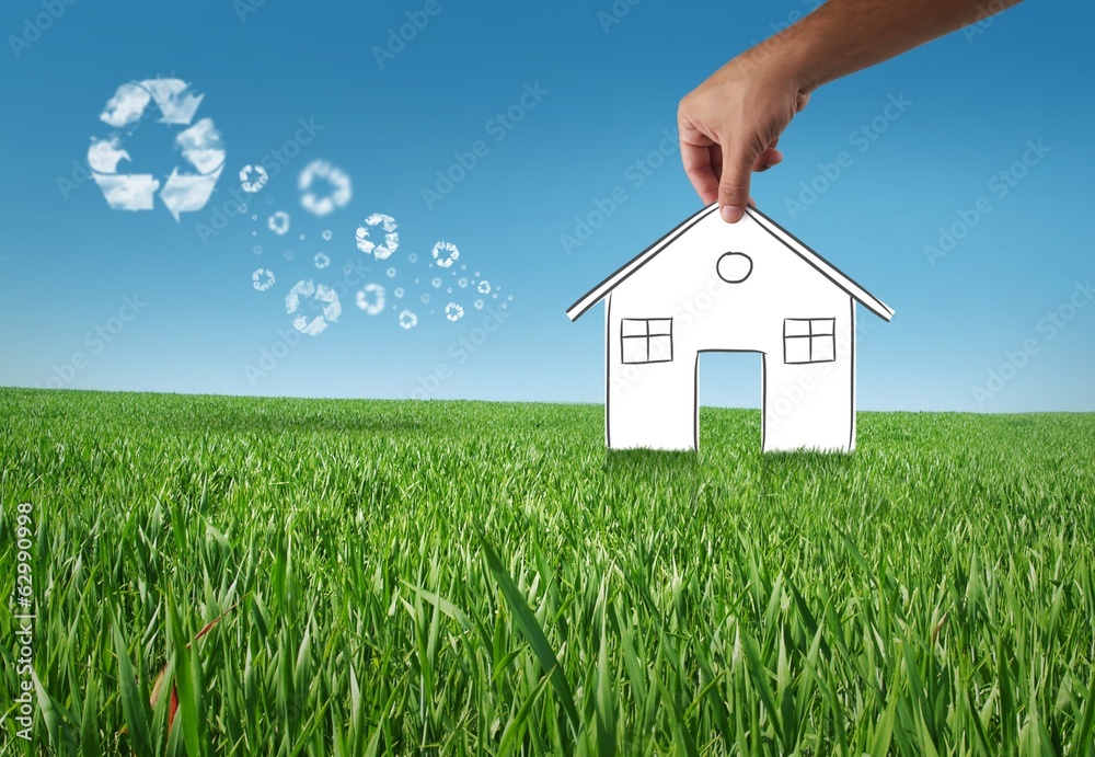 Eco house in the grass, recycle concept. Eco house in the grass, recycle concept.