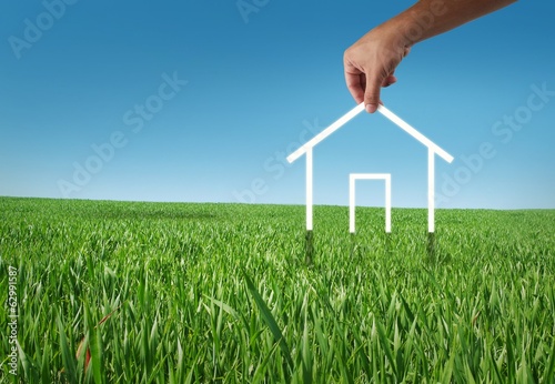 Eco house in the grass, recycle concept.