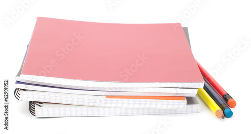 Notebook stack and pencils. Schoolchild and student studies acce