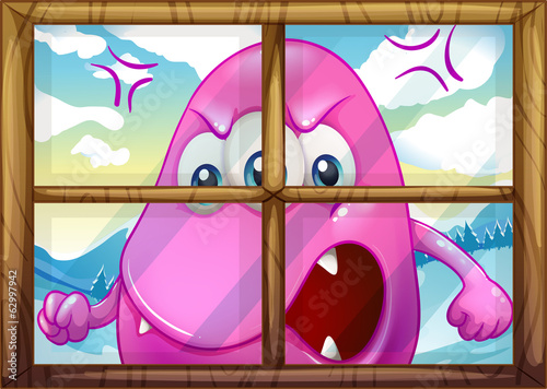 An angry pink monster outside the window