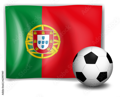 A soccer ball in front of the Portugal flag
