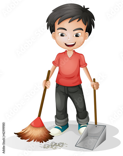 A boy sweeping the dirt