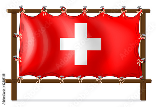 A wooden frame with the flag of Switzerland