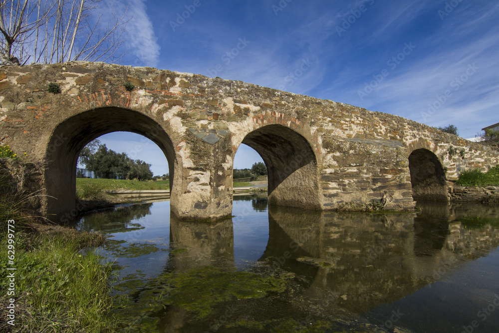 View of an ancient roman bridge located in Almodovar, Portugal.