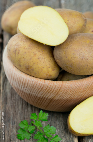 new potato in a wooden bowl