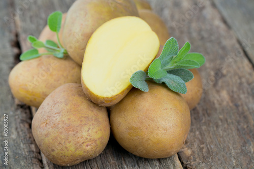 new potatoes on a wooden surface