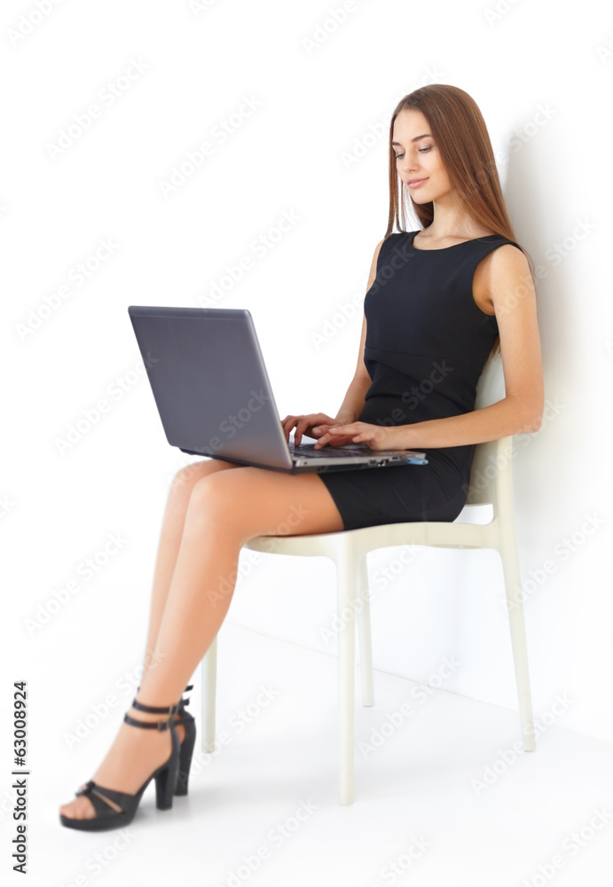 Young business woman with laptop