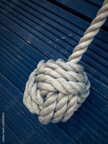 Nautical knot on blue background
