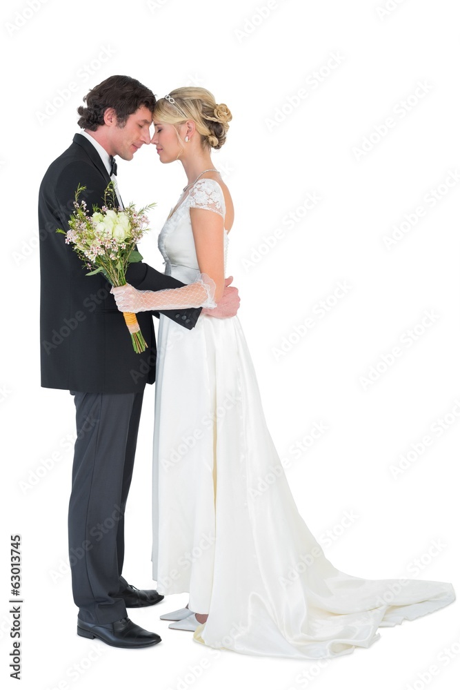 Loving bride and groom with head to head Loving bride and groom with head to head