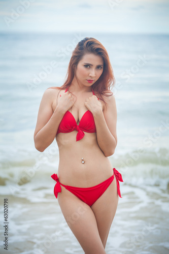 Woman posing at beach