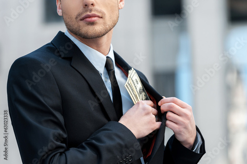 Pocketing company money.