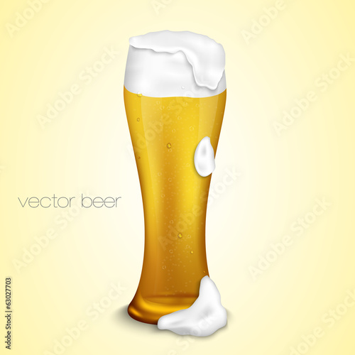 light beer with the foam in a glass