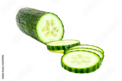 Cut cucumber on white background