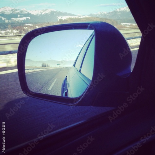 free highway/motorway in a mirror of blue modern car © romanruzicka