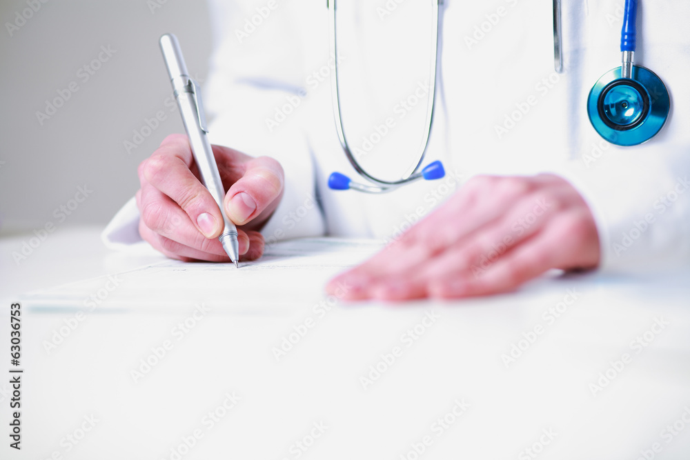 Photography closeup of a female doctor writing a prescription - obrazy, fototapety, plakaty 