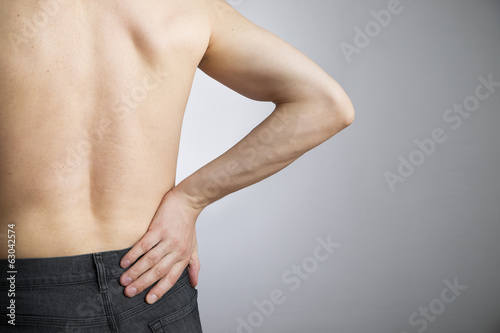 Pain in the lower back in men