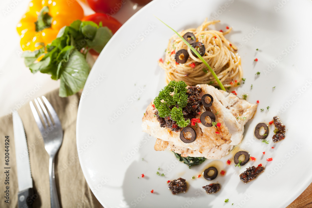 fish steak, decorated fish steak with spinach side spaghetti fish steak, decorated fish steak with spinach side spaghetti