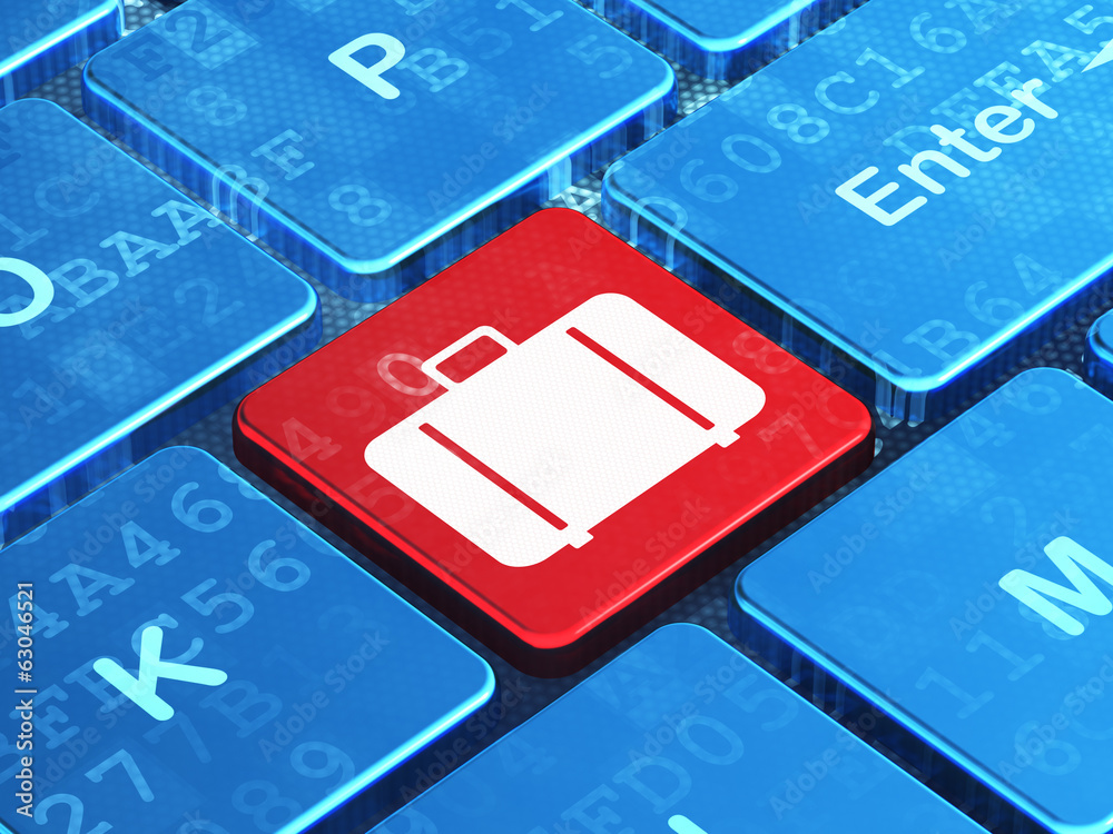 Tourism concept: Bag on computer keyboard background Tourism concept: Bag on computer keyboard background