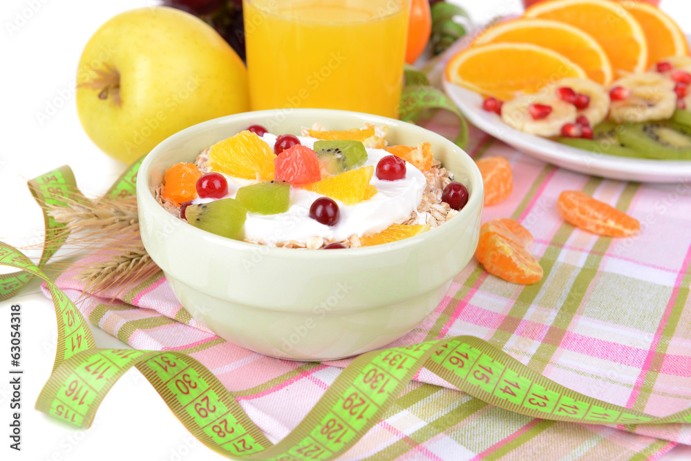 Delicious oatmeal with fruit in bowl on table close-up Delicious oatmeal with fruit in bowl on table close-up