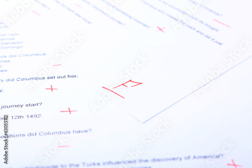 Grade written on an exam paper, close-up