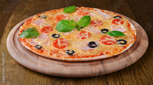 Tasty pizza on table close-up