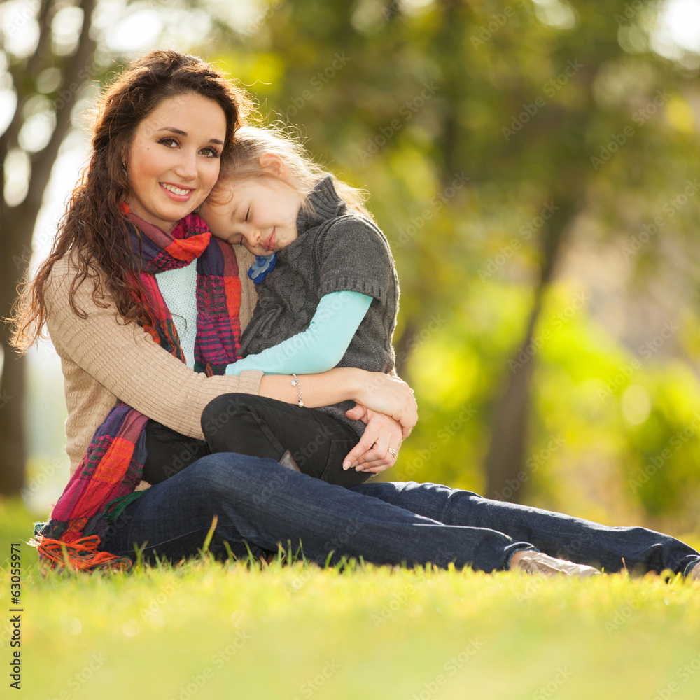 Mother and daughter in the park Mother and daughter in the park
