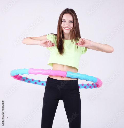 Woman doing exercises with ...