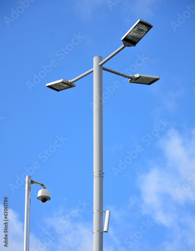 Street lamp and CCTV with big blue sky