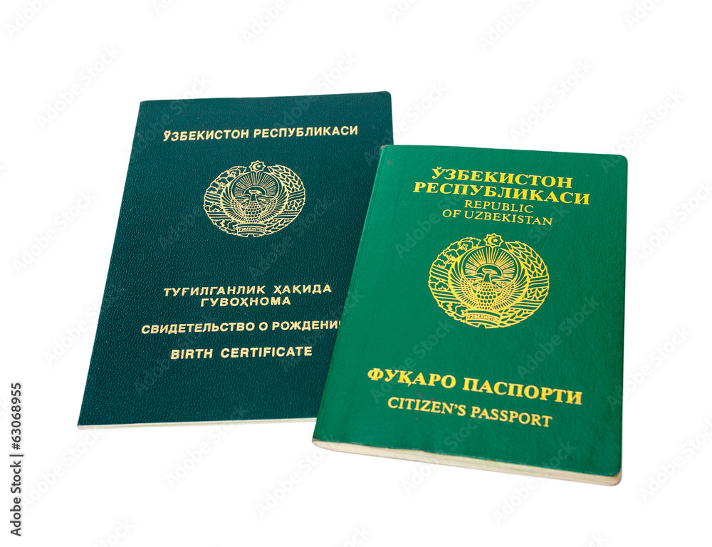 Uzbekistan passport and birth certificate isolated on the white