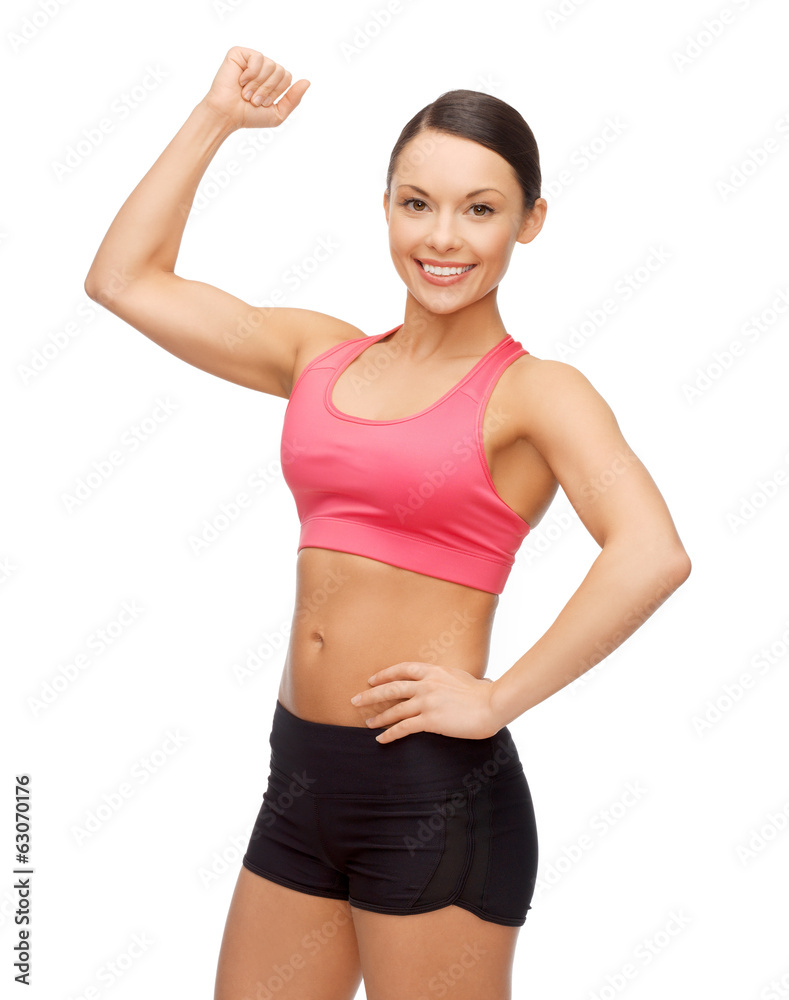 asian sporty woman flexing her biceps asian sporty woman flexing her biceps