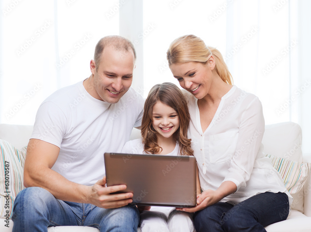 parents and little girl with laptop at home parents and little girl with laptop at home
