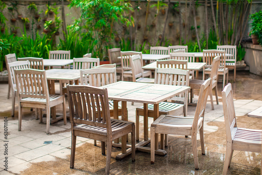 Hotel patio with wooden white furniture