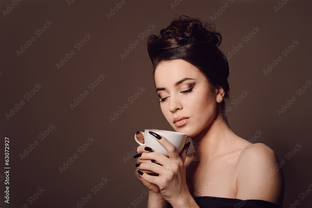 beautiful young girl with the cup of coffee beautiful young girl with the cup of coffee
