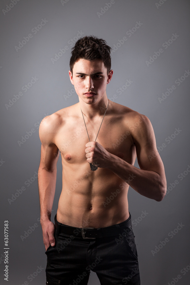 Fototapeta premium Portrait of young bodybuilder man