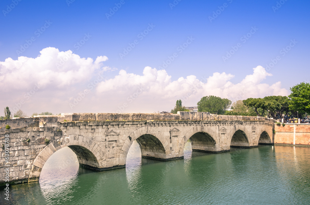 Roman Tiberius Bridge on Marecchia river in Rimini Italy
