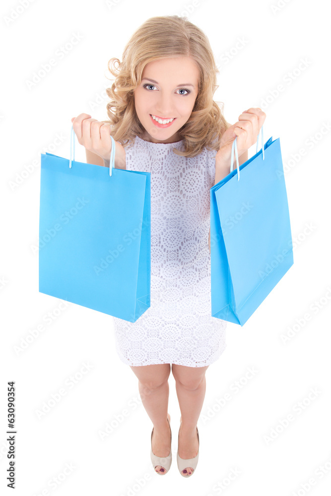 funny girl with shopping bags isolated on white funny girl with shopping bags isolated on white