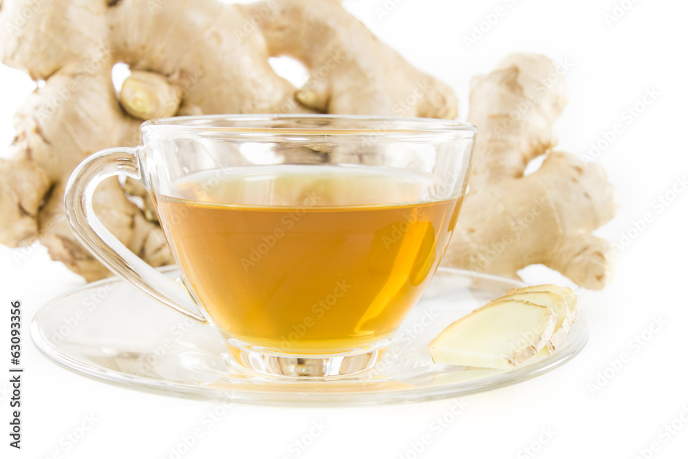 Fresh ginger and tea in glass on white. Fresh ginger and tea in glass on white.