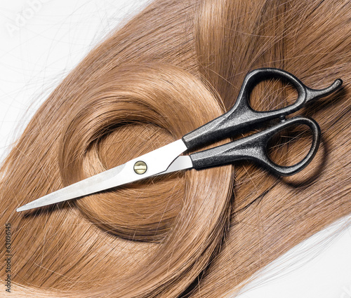 scissors on lock of hair