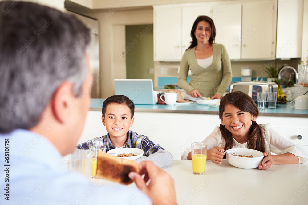 Hispanic Family Eating Breakfast At Home Together Hispanic Family Eating Breakfast At Home Together