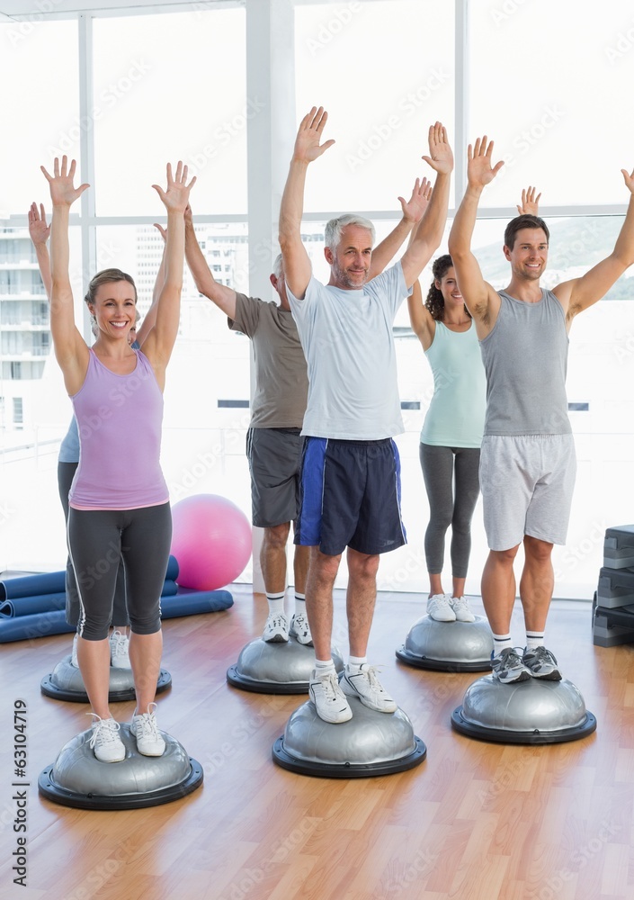 Smiling people doing power fitness exercise Smiling people doing power fitness exercise