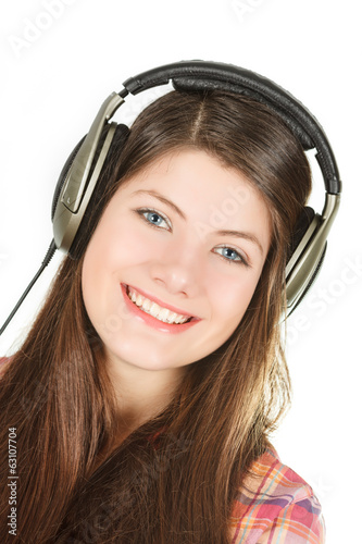 a portrait of happy smiling girl is in headsets